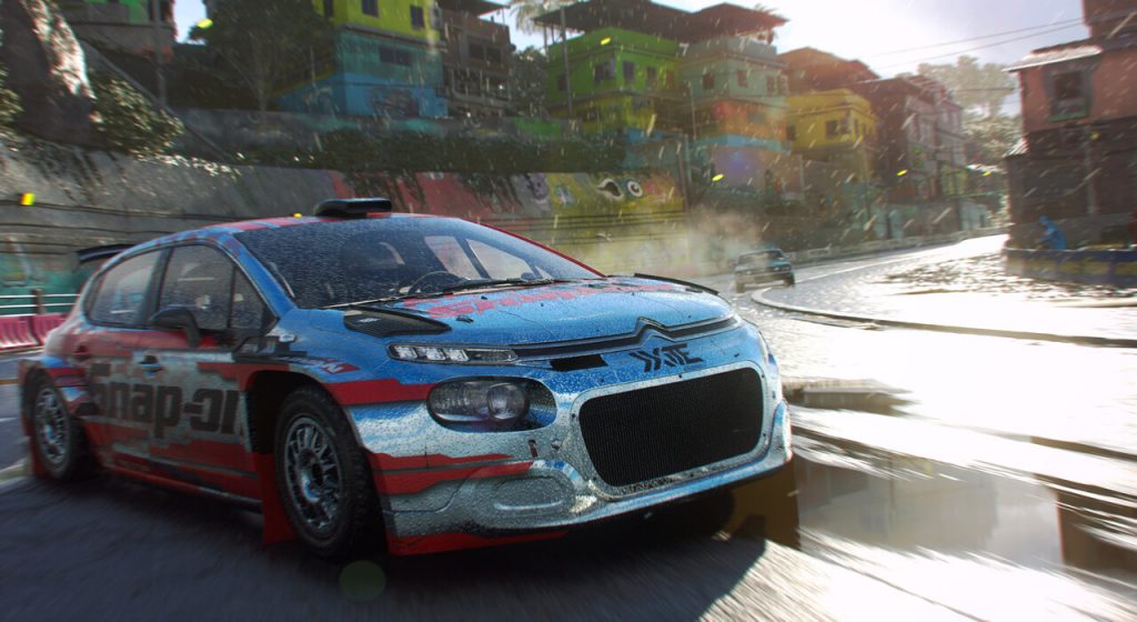 a car drives on a wet road in dirt 5