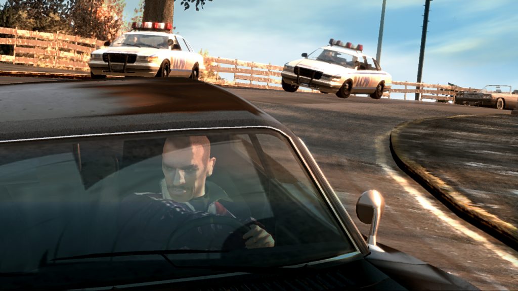Niko from Grand Theft Auto 4 beging chased by police in a car chase.