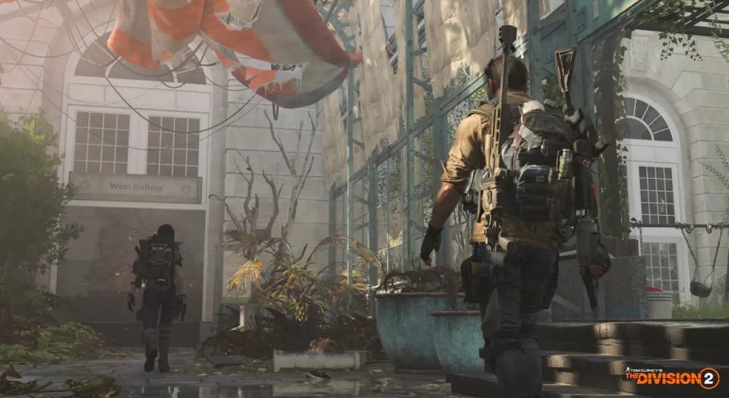 The Division 2 agents walking into a building